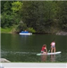 Two girls paddleboarding